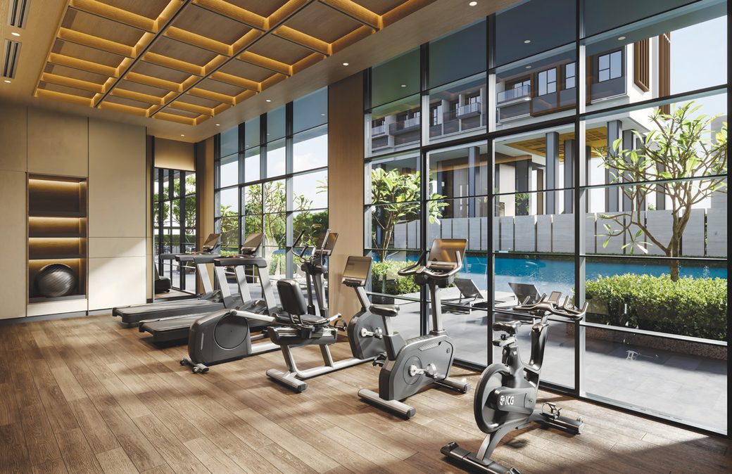 Hudson Place Residences gym with floor-to-ceiling windows overlooking the pool